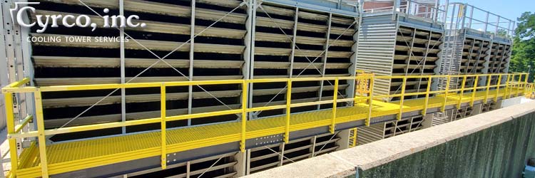 Custom FRP Walkway with Hand Rails to Access Aluminum Fan, Fan Gearbox, and Drive Shaft on a Field Erected FEP Cooling Tower.