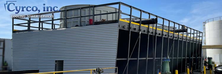 Custom Constructed Three Cell Field Erected Cooling Tower FRP Composites Wall Casing, Fan Stack, Fiberglass Fan, FRP Square Tube Framing. Quality Gearbox and Film Fill Media, Multiple Drift Eliminators Facing Retaining Pressure and Preventing Water Drift Droplets.